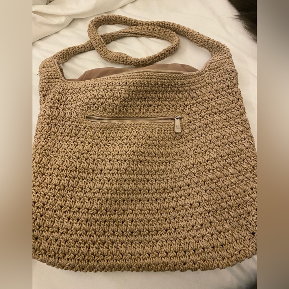 The sak brand shoulder bag. Tan color. Excellent condition